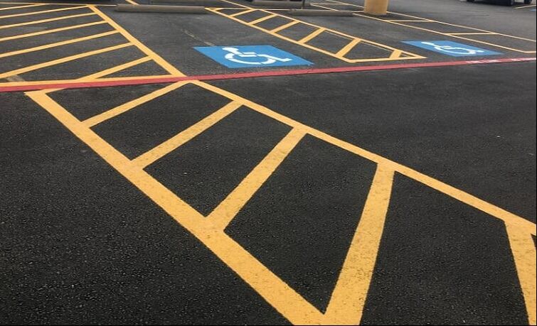 Yellow lines and handicap stenciling in your parking lot in Fisher, Indiana
