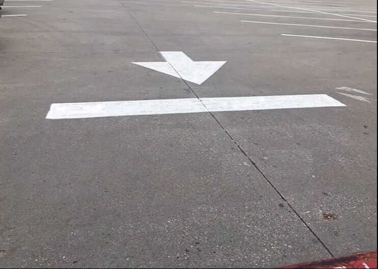 White arrow and line striping in your parking lot in Fisher, Indiana
