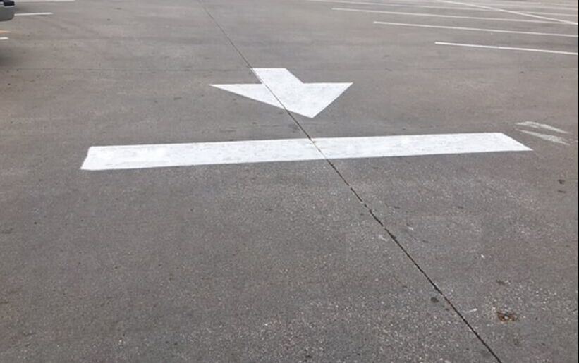 White directional arrows in your parking lot Westfield, Indiana